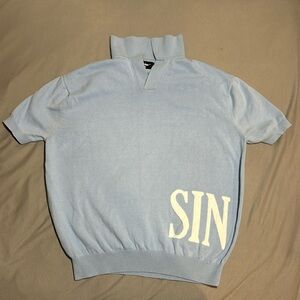 I am selling a sinclair polo light blue t-shirt xs unisex